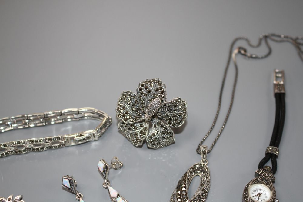 Six assorted items of marcasite jewellery including a pair of earrings, ring, brooch, bracelet and a Gianni Vecci ladys watch.